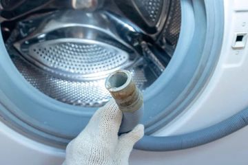 Cek selang air mesin cuci